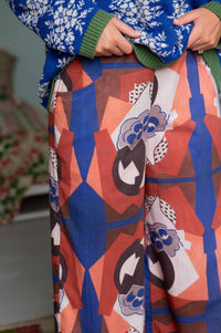 Agnes Jumper & Ollie composition - patterned trousers & blue sweater