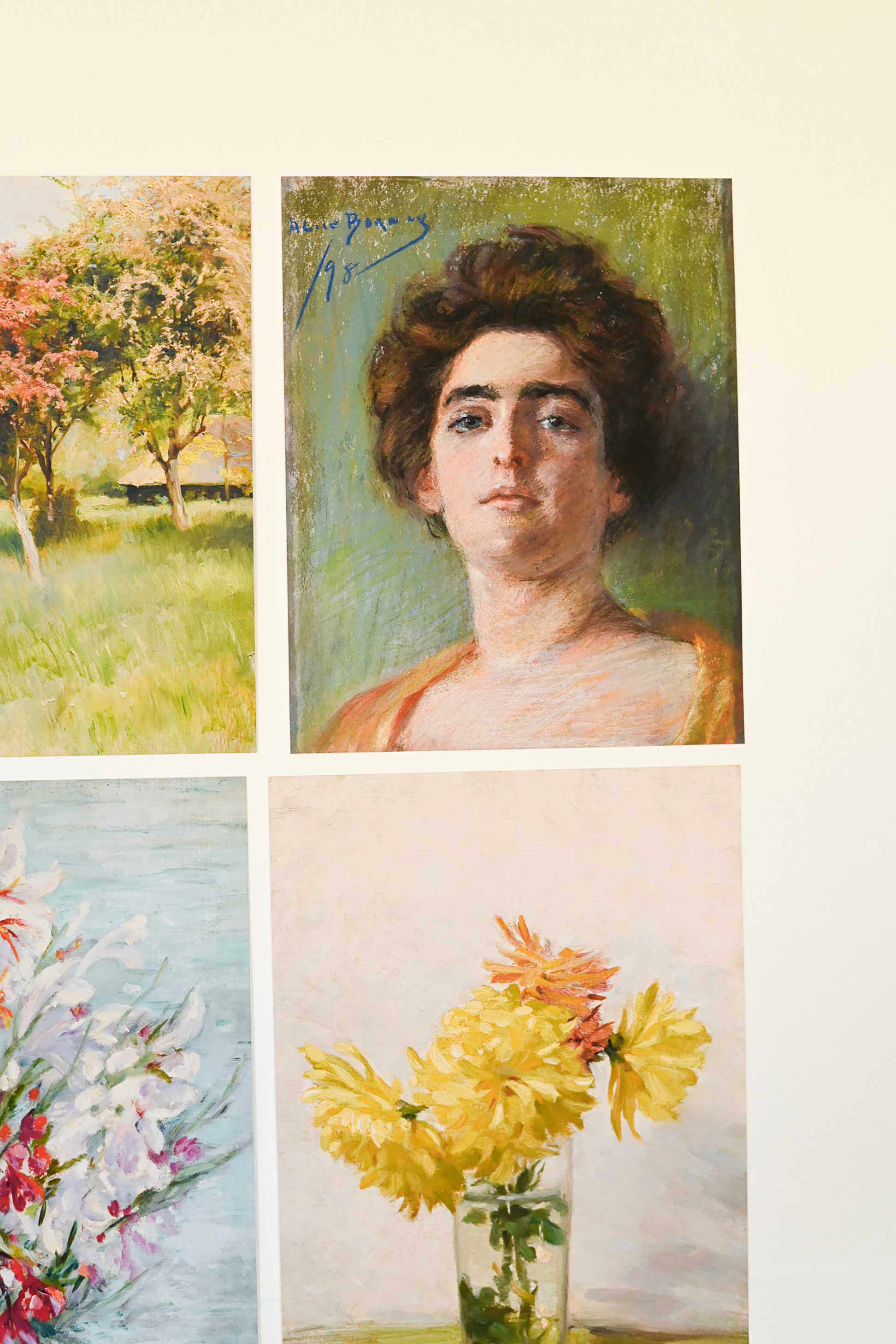 Paris-themed art prints, including a portrait.