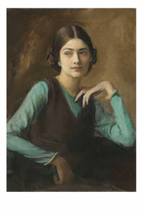 Portrait of a woman with teal shirt and dark vest.