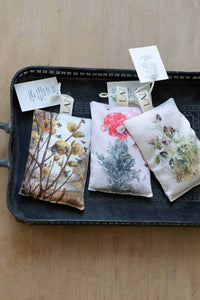 Orange Bee sachet with botanical print on tray