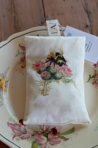 Bee scented sachet on decorative plate