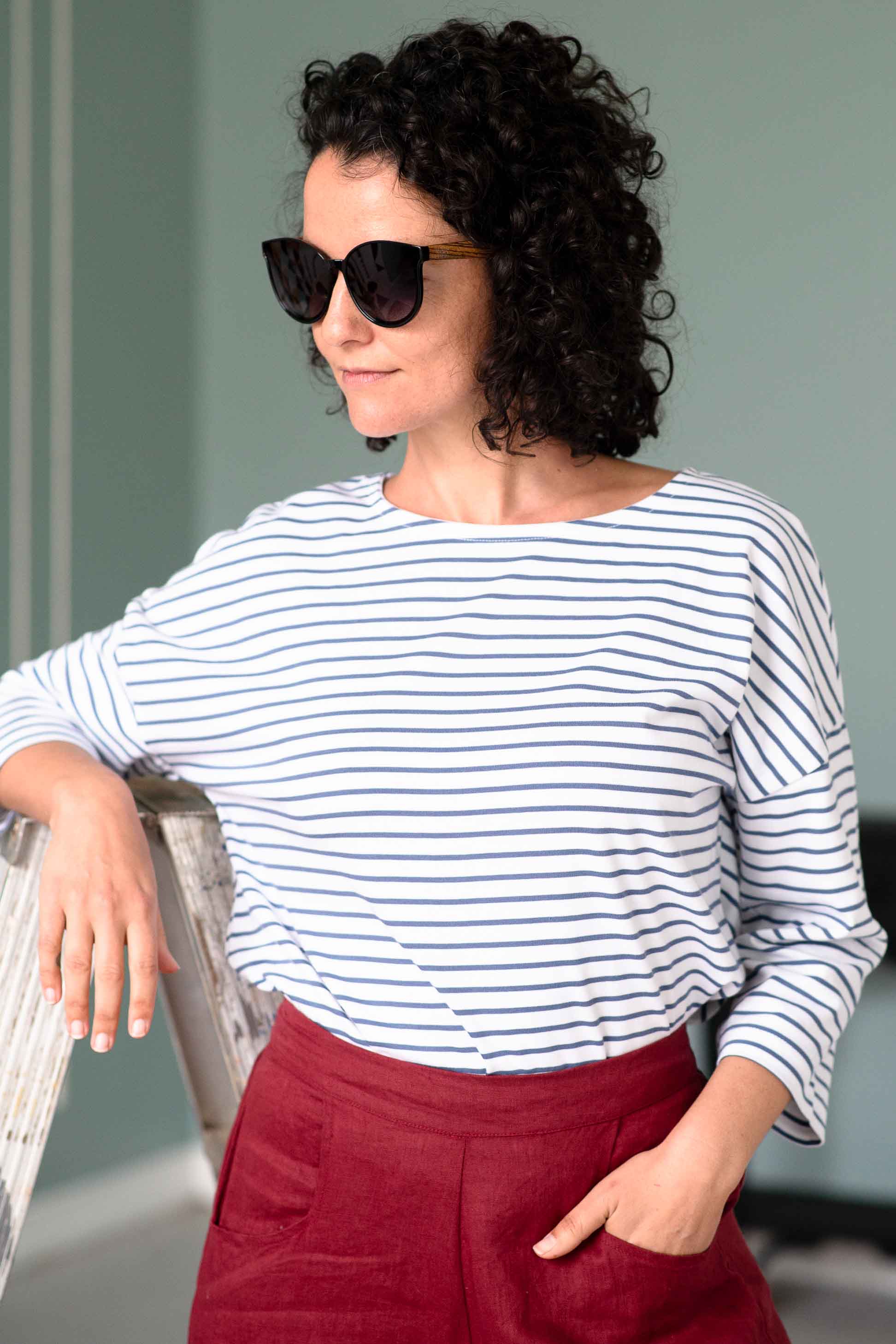 woman in striped shirt and sunglasses