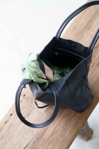 Blue leather tote bag with scarf