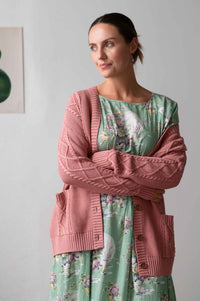 Woman in pink cardigan, Charli Dusty Pink Faith Newlyn