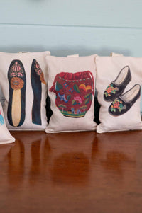 Scented sachets with shoe and bag designs.