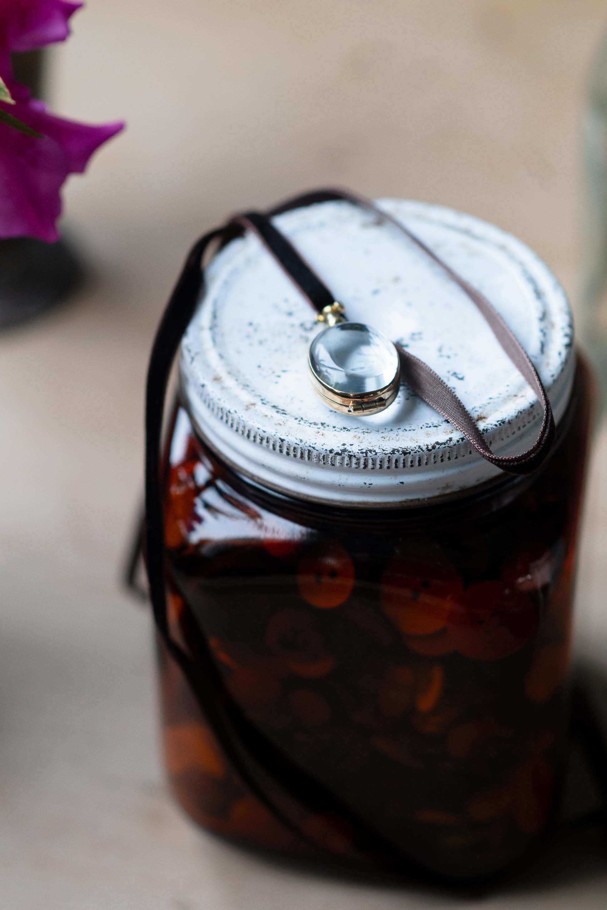 Crystal oval locket on jar, DSC3042