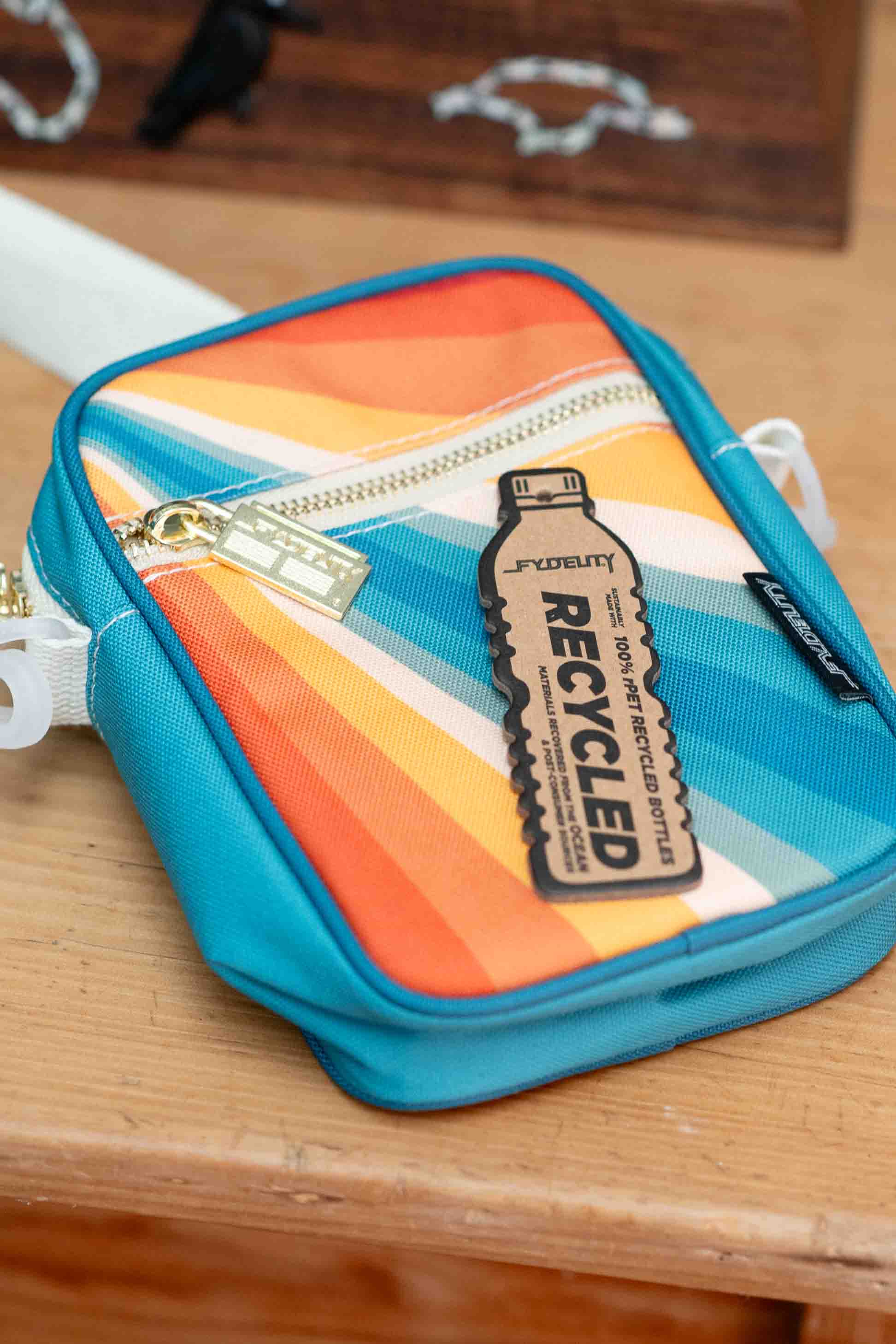 Recycled bottle crossbody bag with rainbow design