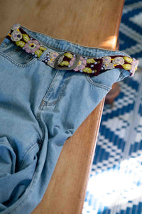 Embroidered belt on blue jeans - DSC5052