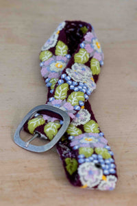 Embroidered floral belt with silver buckle