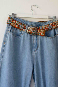 Embroidered belt on blue jeans, DSC5078