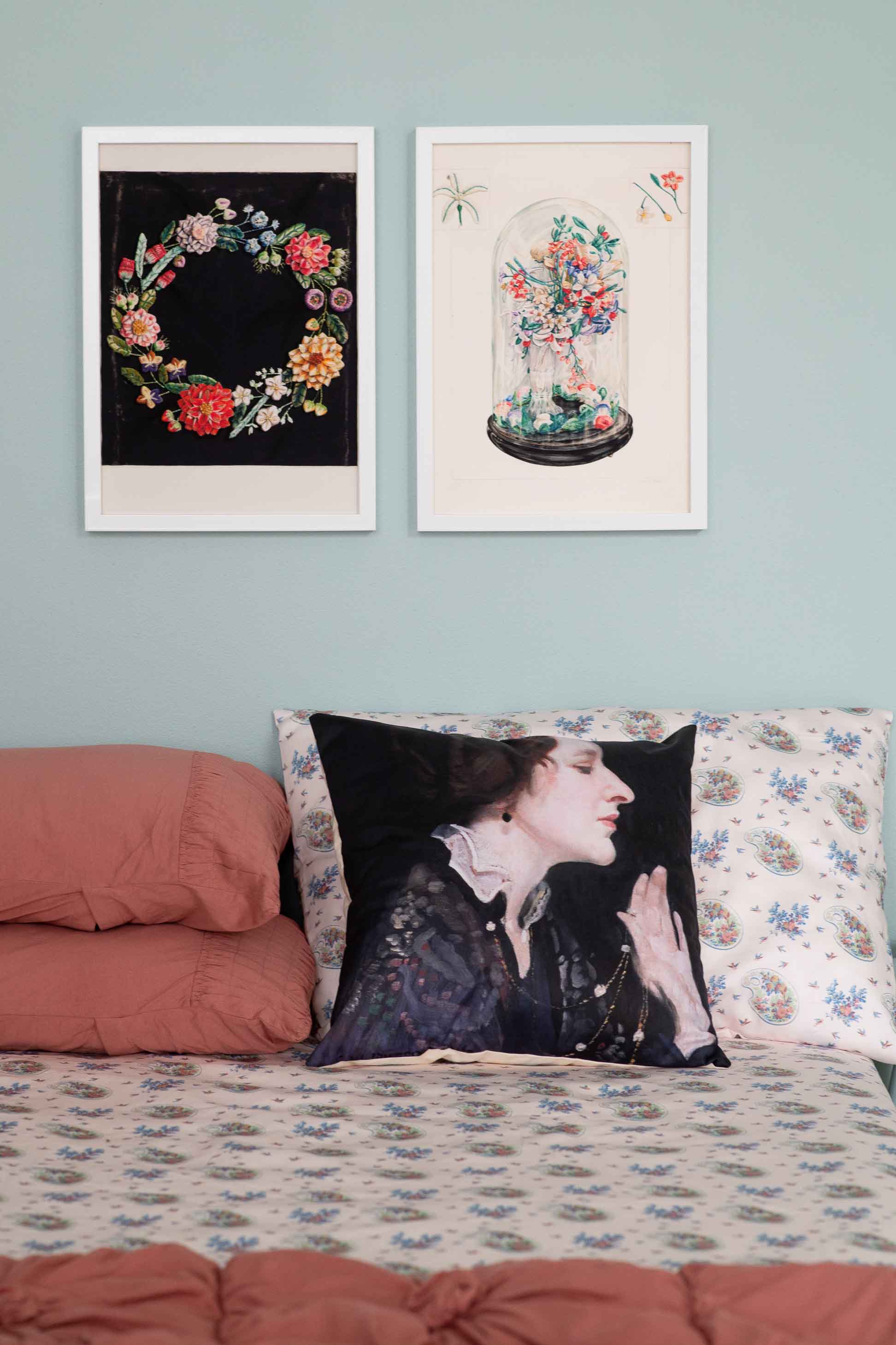 Floral art & woman pillow on bed