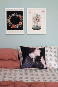 Floral art & woman pillow on bed