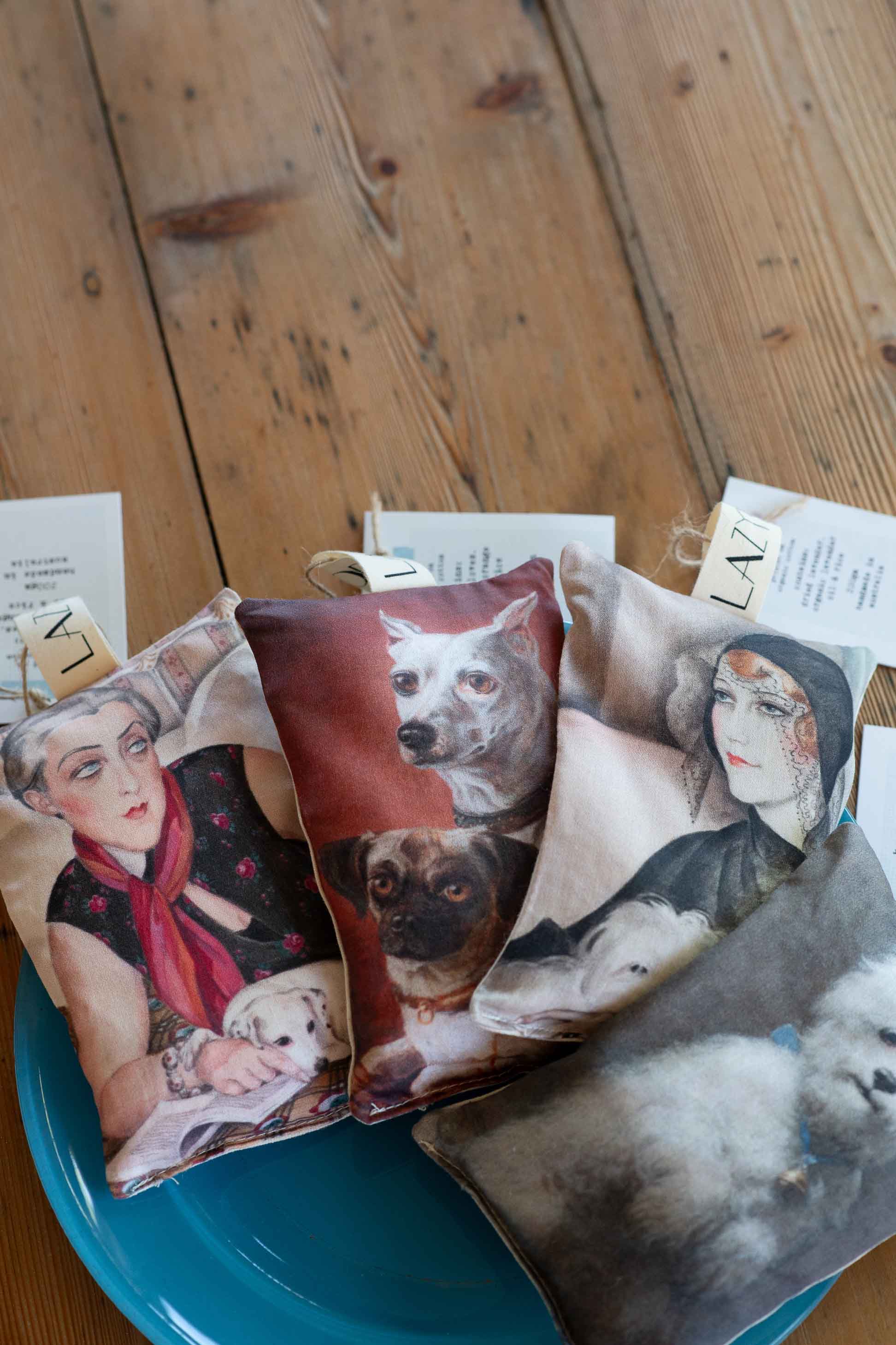 Dog and woman-themed scented sachets on display