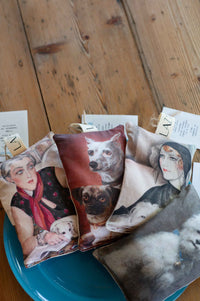 Dog and woman-themed scented sachets on display