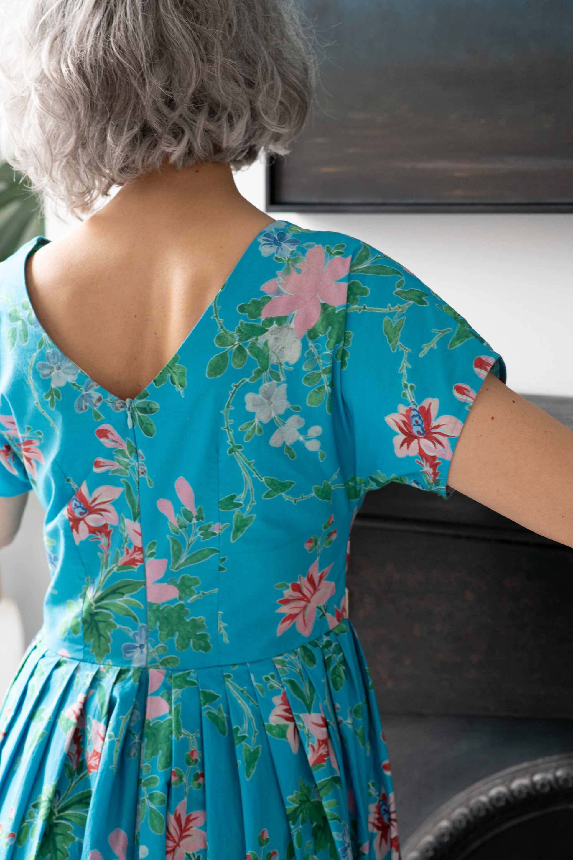 Ella Bluesette in floral blue dress