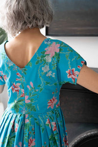 Ella Bluesette in floral blue dress