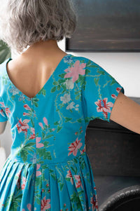 Ella Bluesette in floral blue dress
