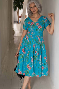 Ella Bluesette in blue floral dress