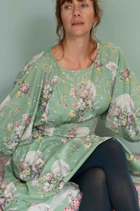 Faith Newlyn in floral dress