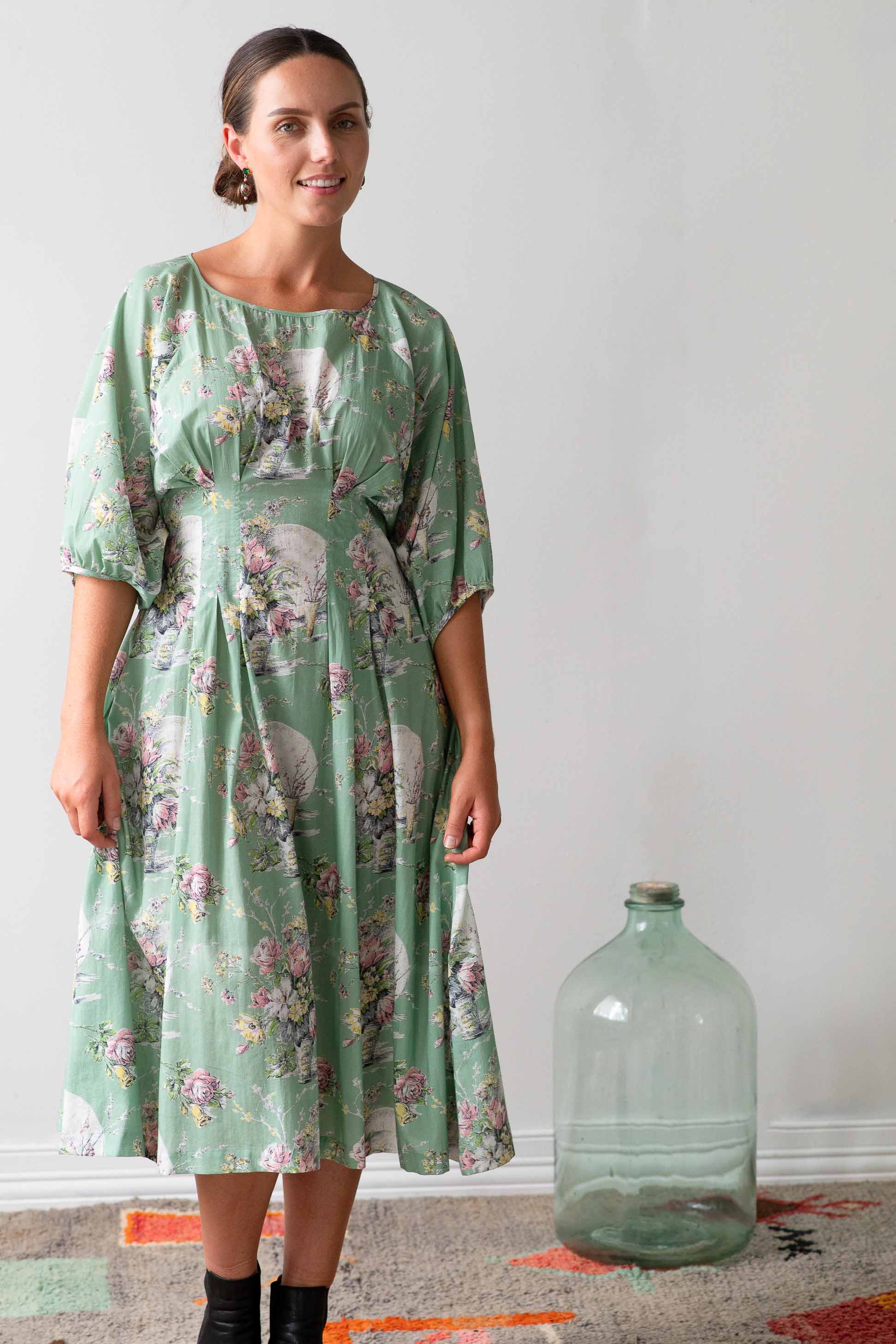 Woman in floral dress, Faith Newlyn