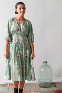 Woman in floral dress, Faith Newlyn