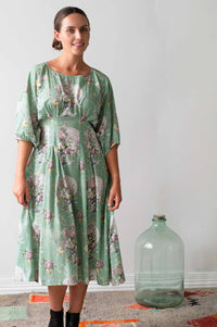 Woman in floral dress, Faith Newlyn