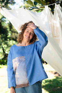 Woman wearing blue shirt with cloud design, FaraClouds_DSC7208