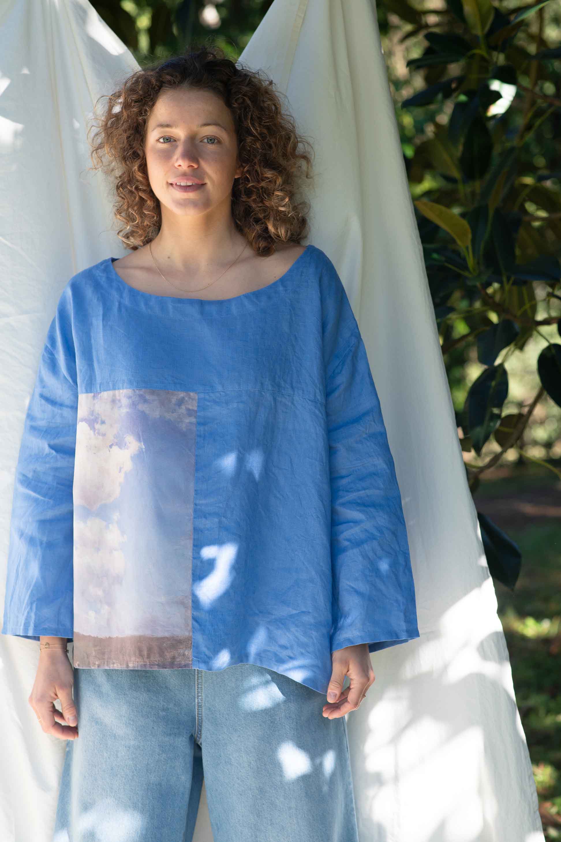 Woman in blue top with cloud patch, FaraClouds_DSC7296
