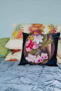 Flower study pillow set on bed