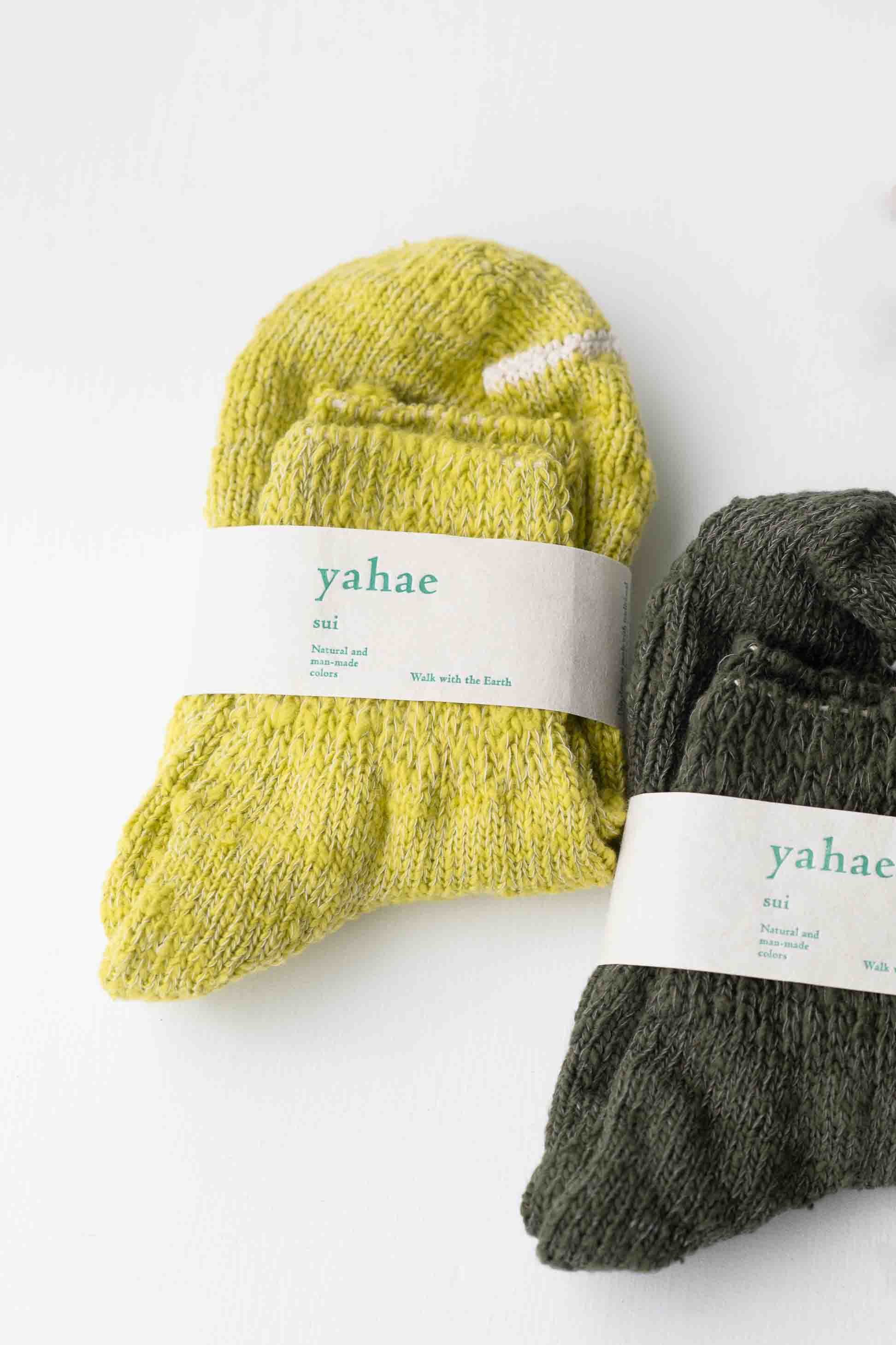 Pair of green and yellow knit socks