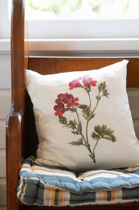 Geranium cushion on bench