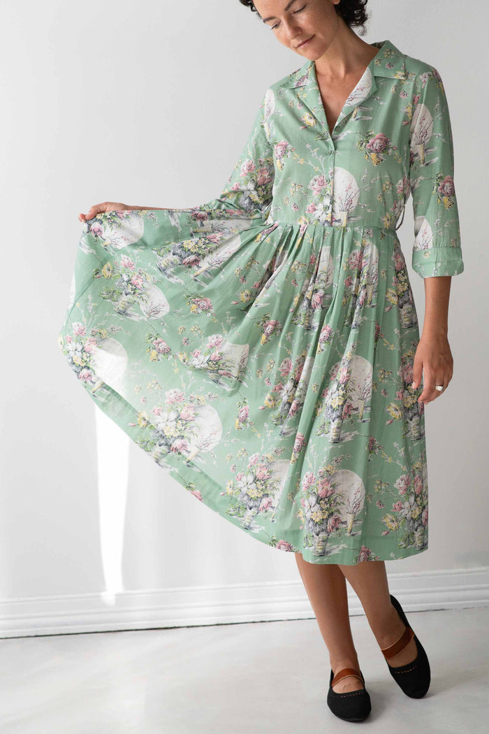 Gianna Newlyn in floral green dress