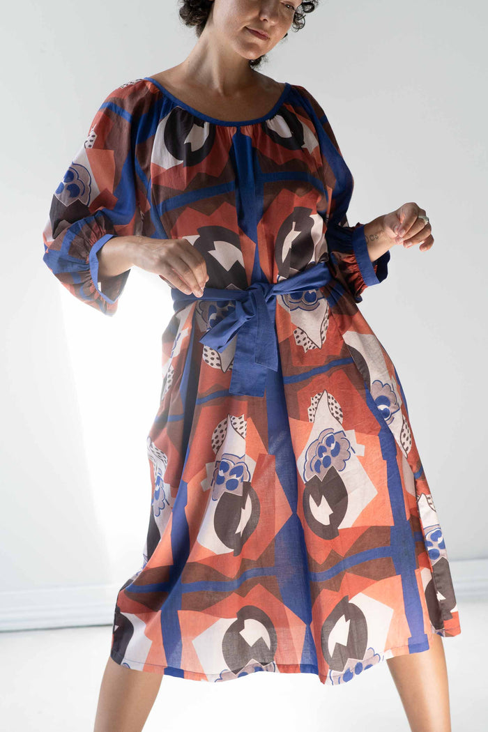 Woman in patterned dress