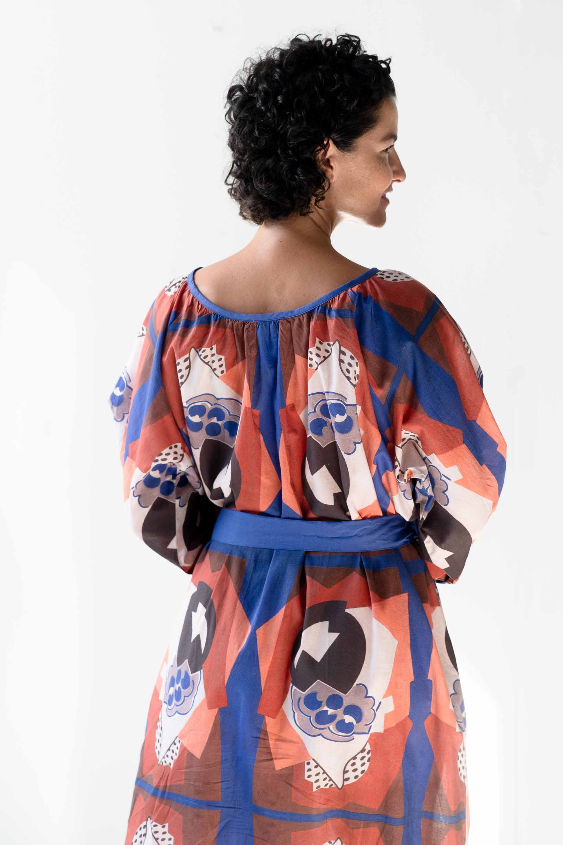 woman in patterned dress