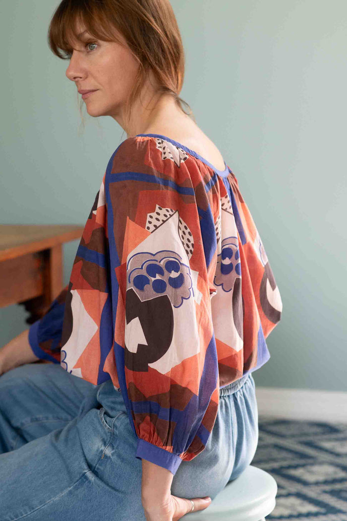 Woman wearing Hetti Top with Ollie Denim jeans