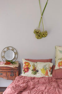 Rosette quilt & cedar pillowcase set on bed