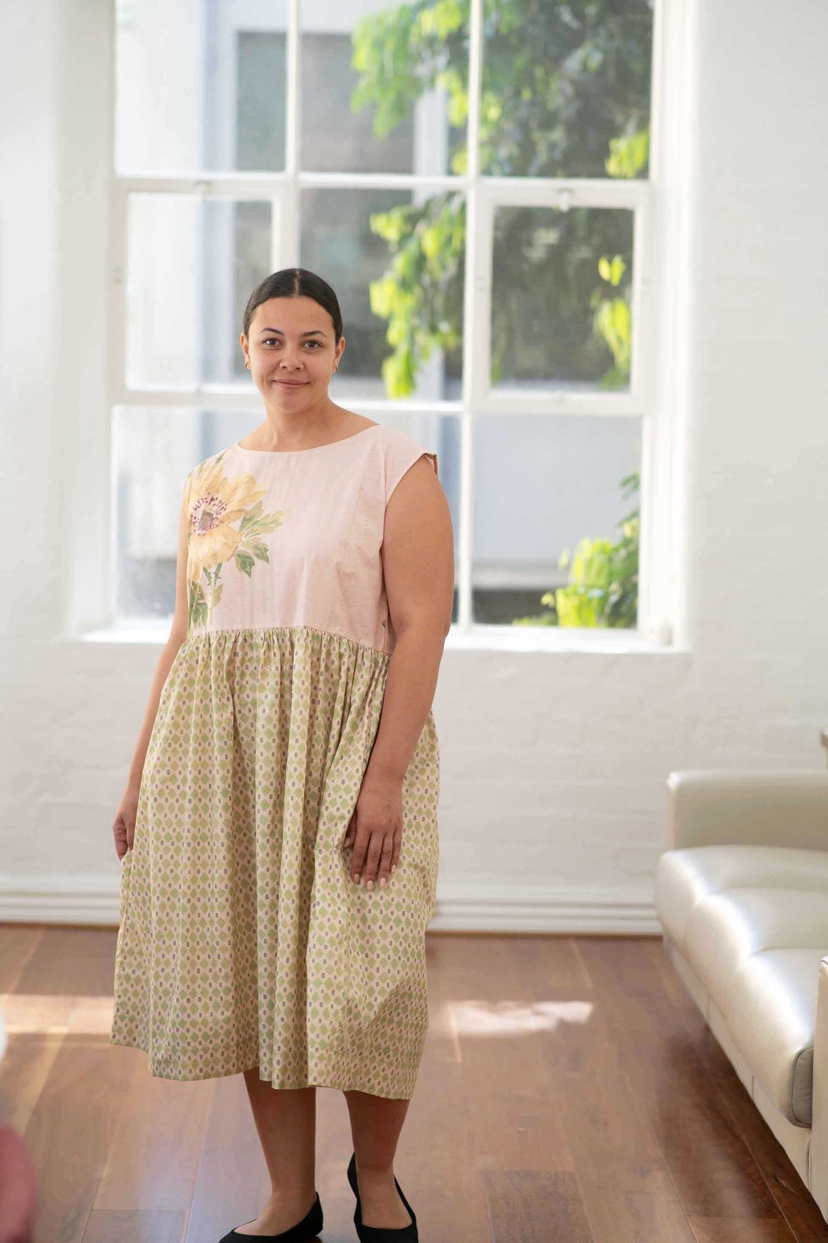 Janey Larkin in floral dress