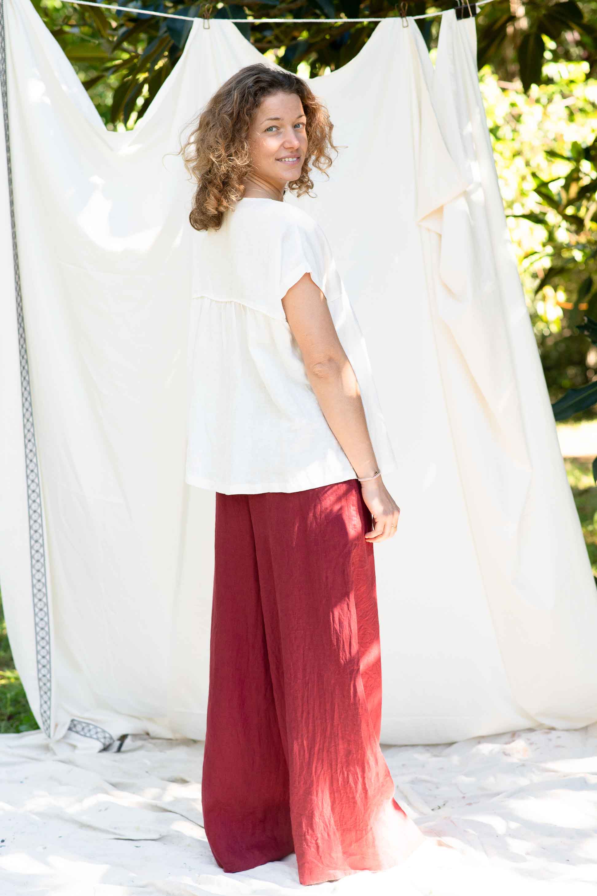 Julia White in red pants and Ollie top