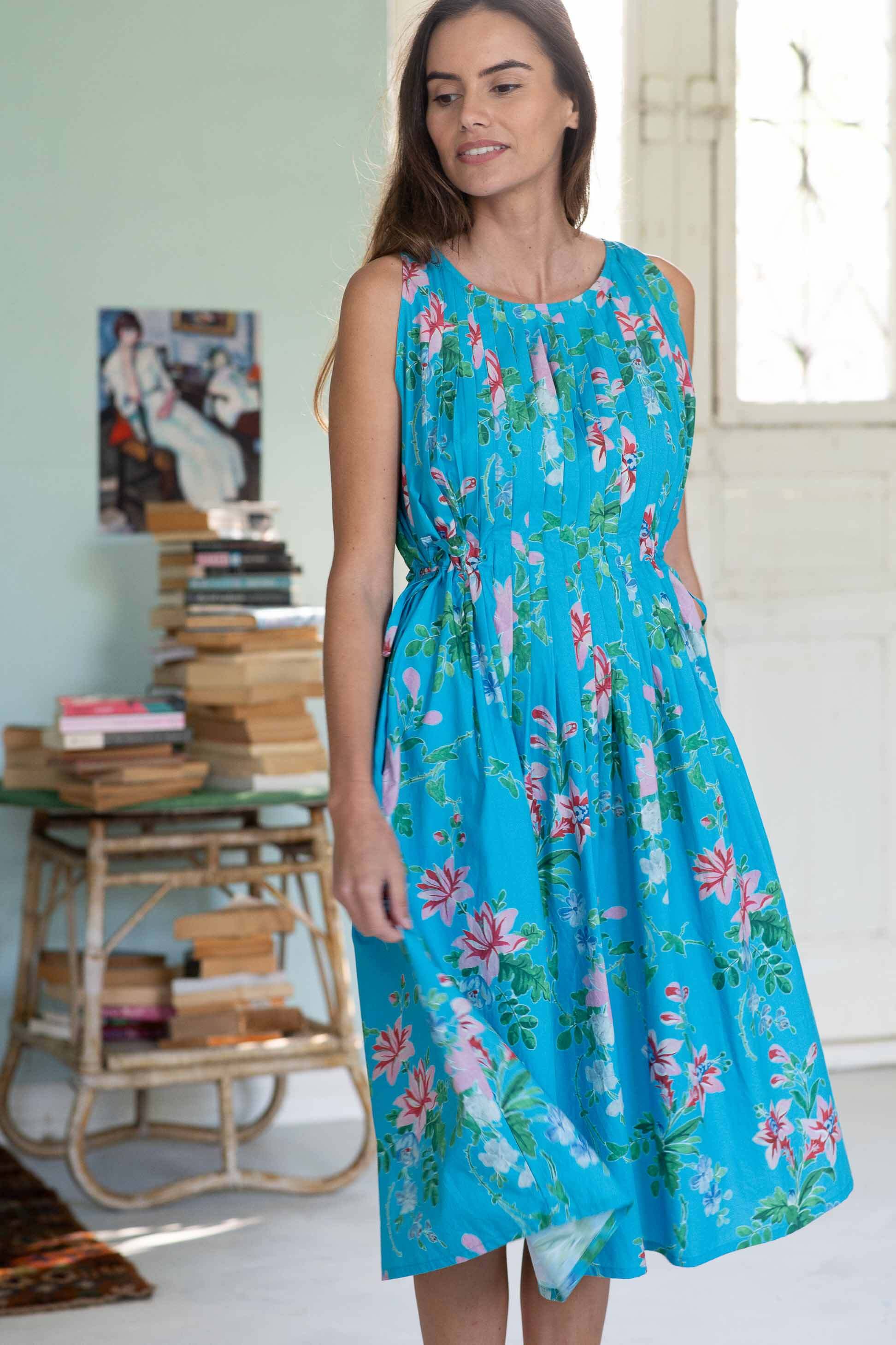 Katy Bluesette in a blue floral dress