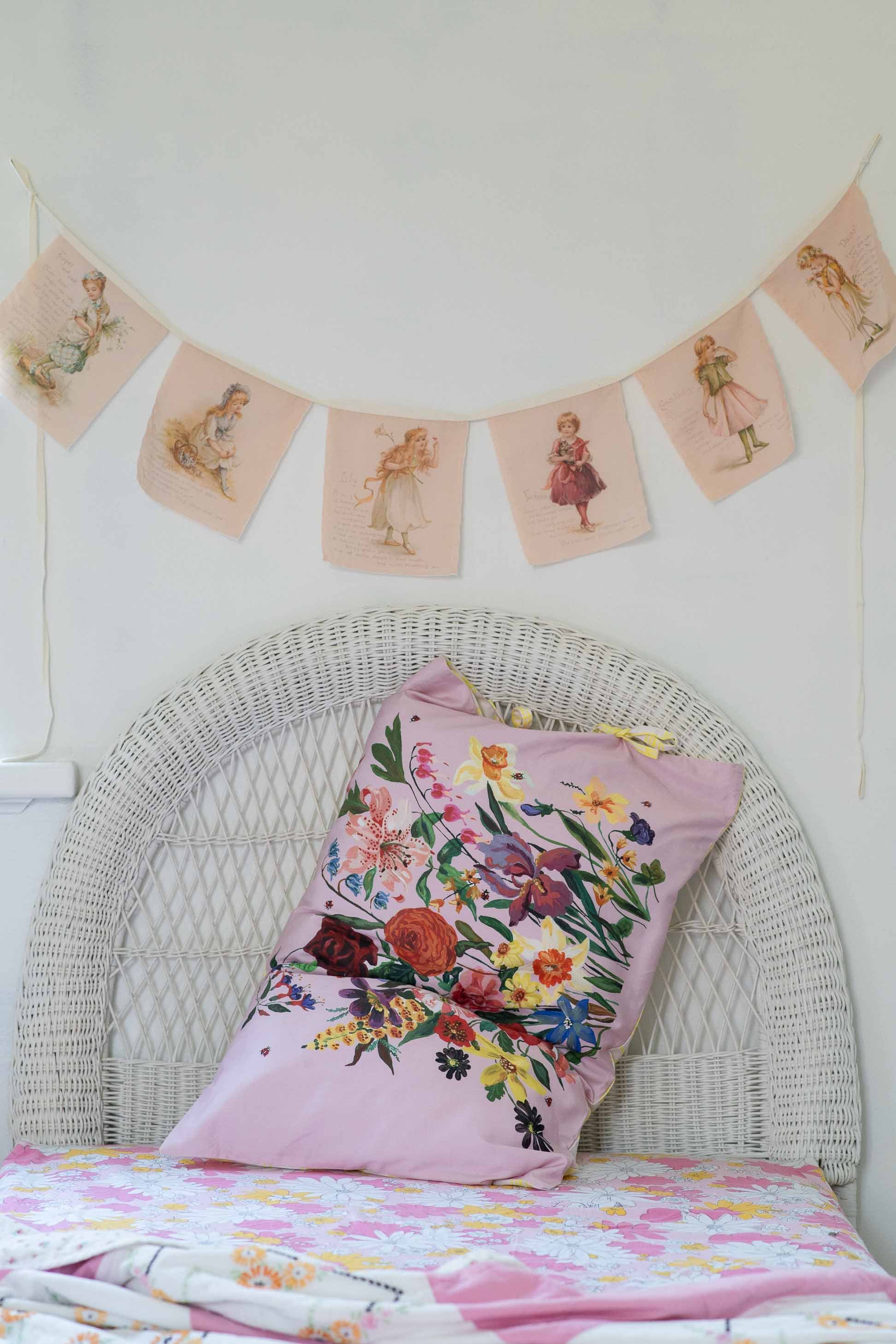 Language of Flowers pillowcase set with garland and floral bunch.