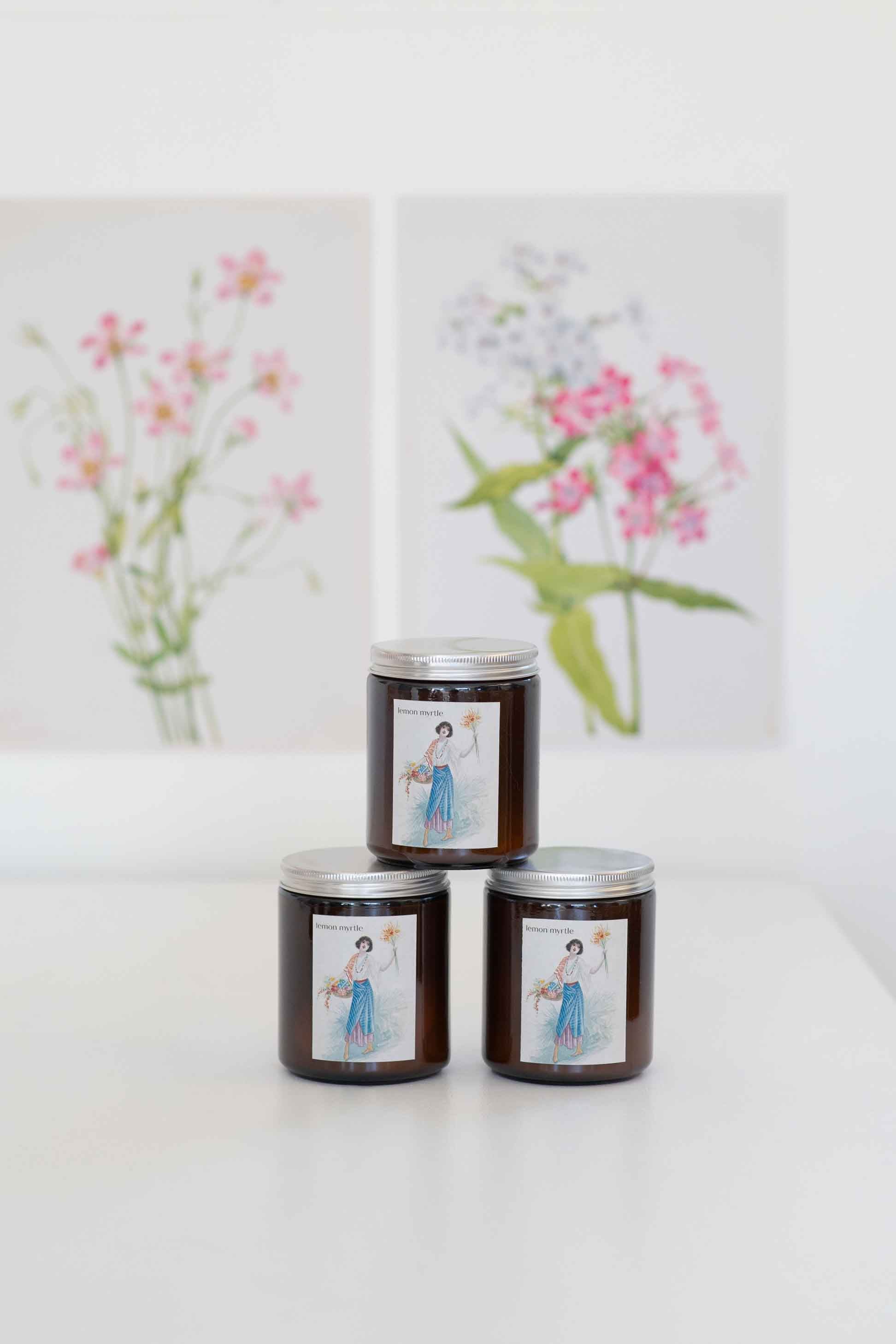 Lemon Myrtle Candle Stack with Floral Background