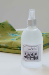 Linen spray bottle with green fabric