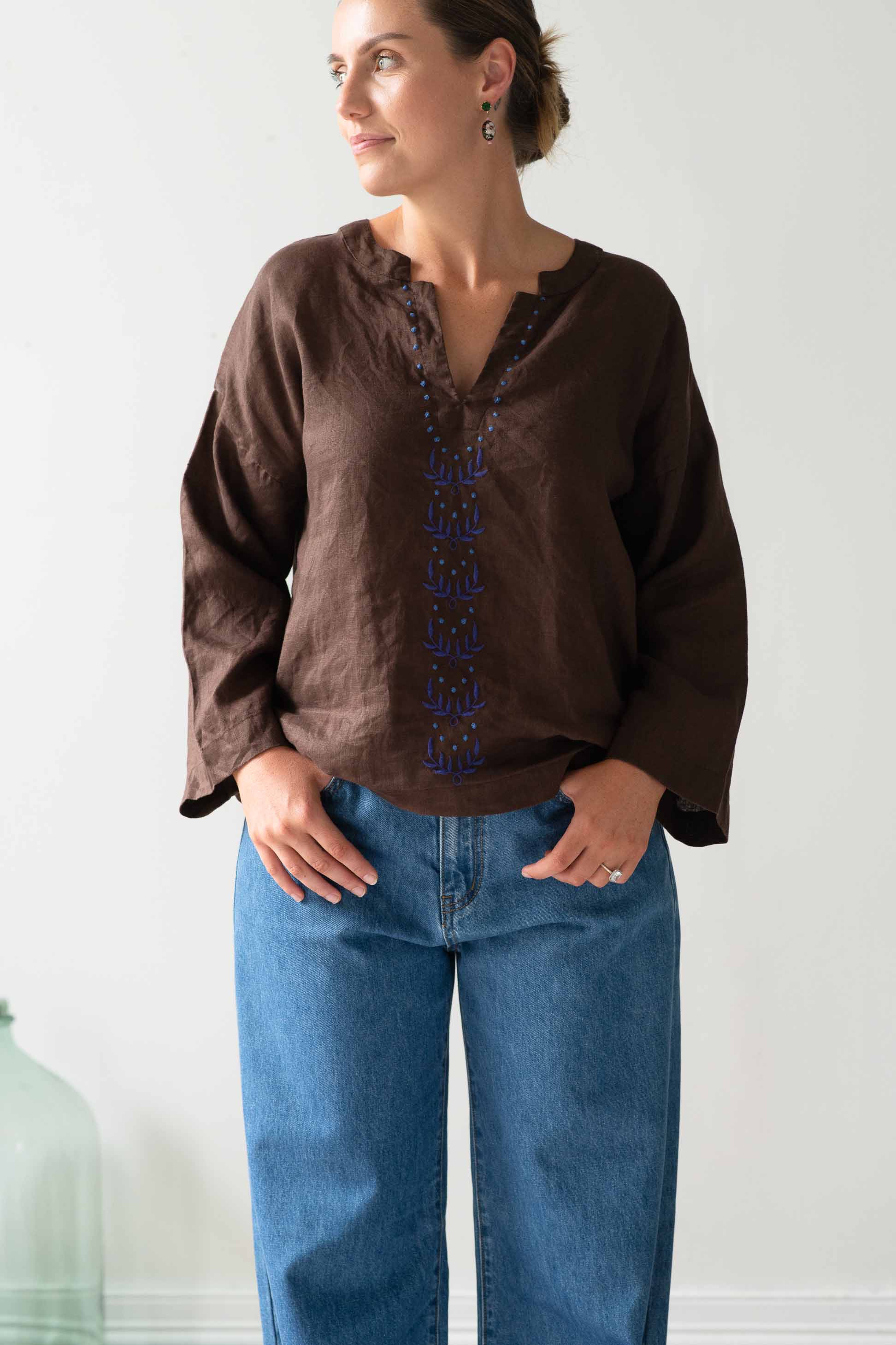 Woman in Marli Chicory Nico Jeans, brown top and jeans