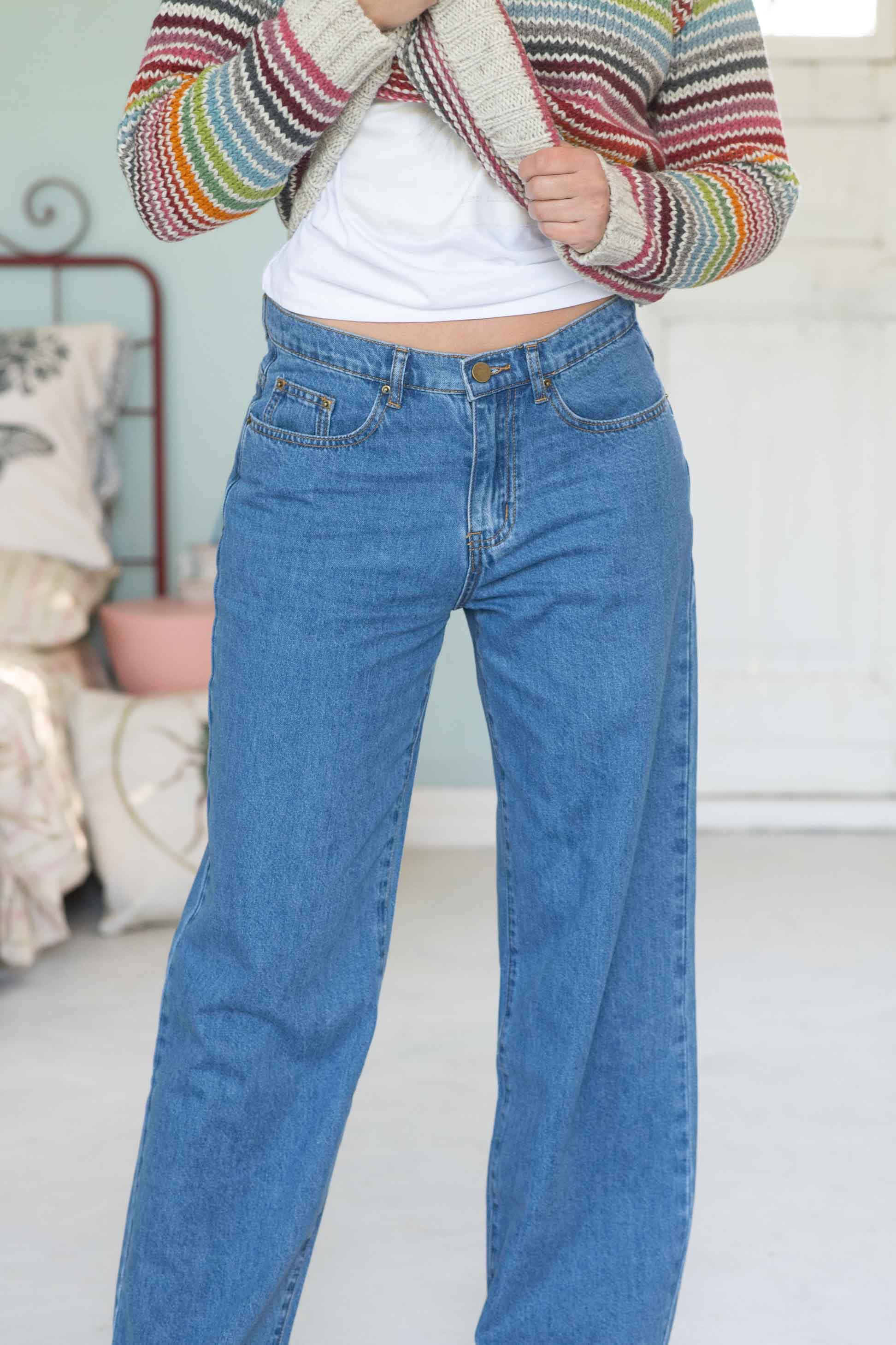 NicoJeans light wash denim jeans with striped sweater