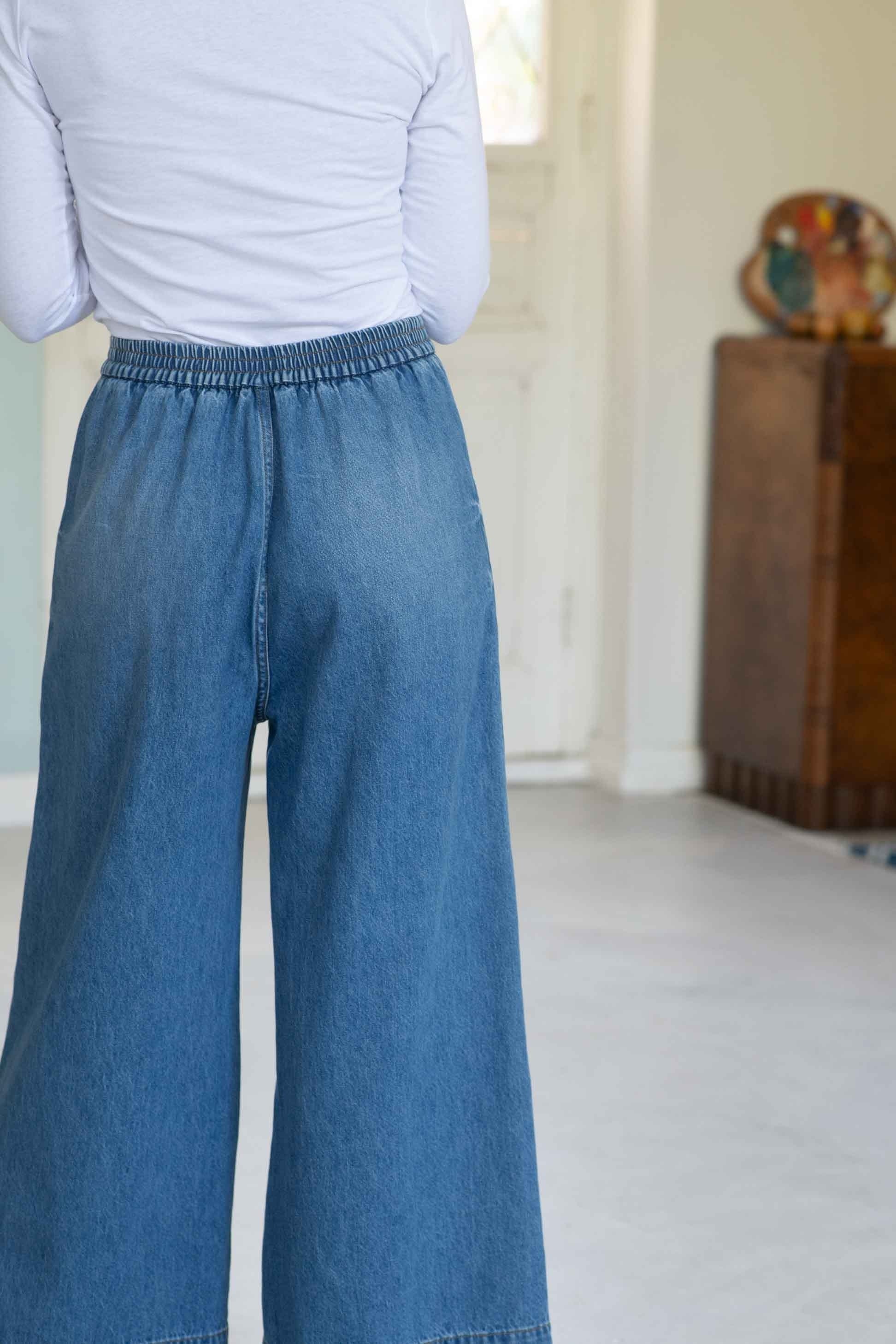 Ollie Denim Fanny Tee, rear view of denim pants and white top