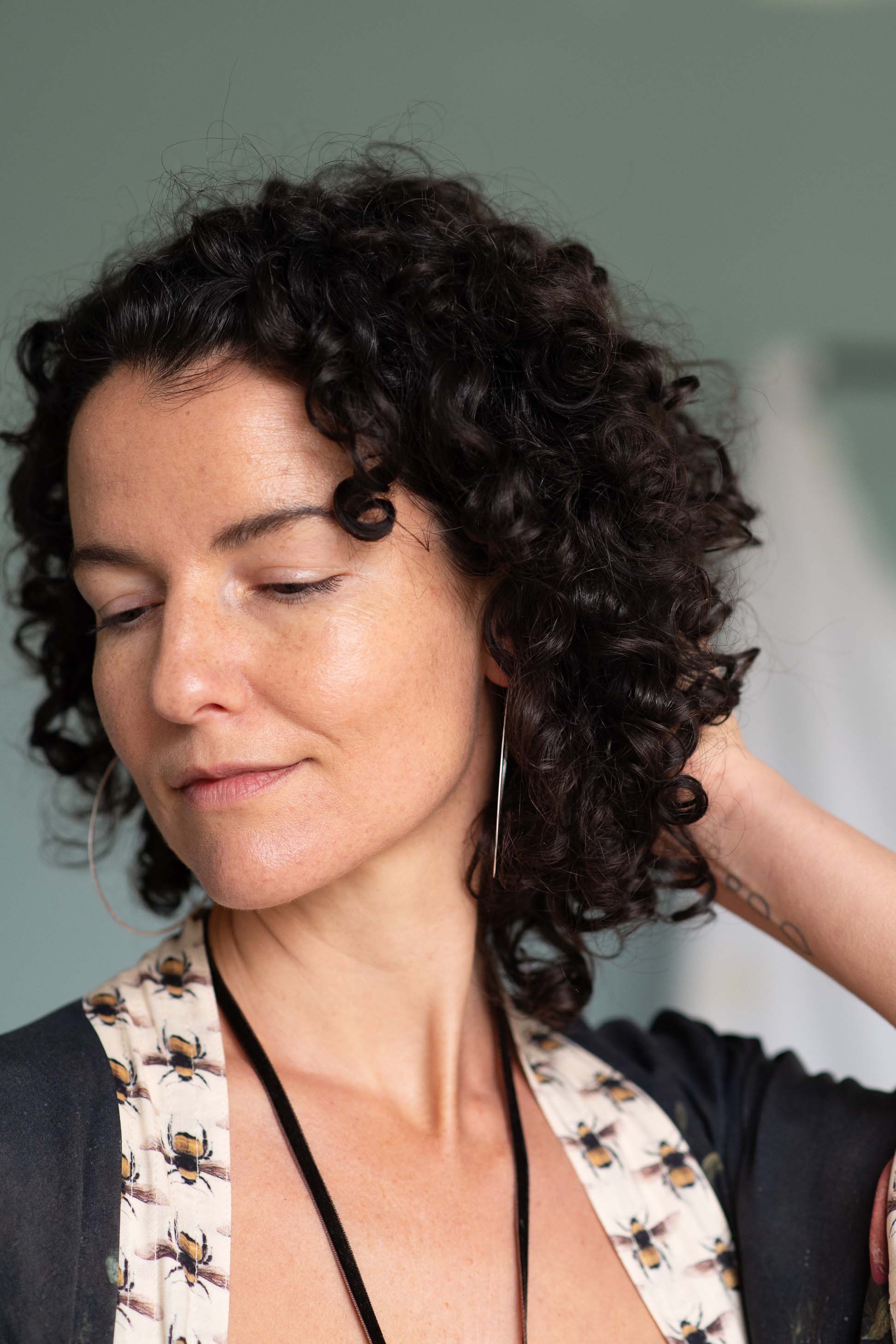 Woman with silver hoop earrings