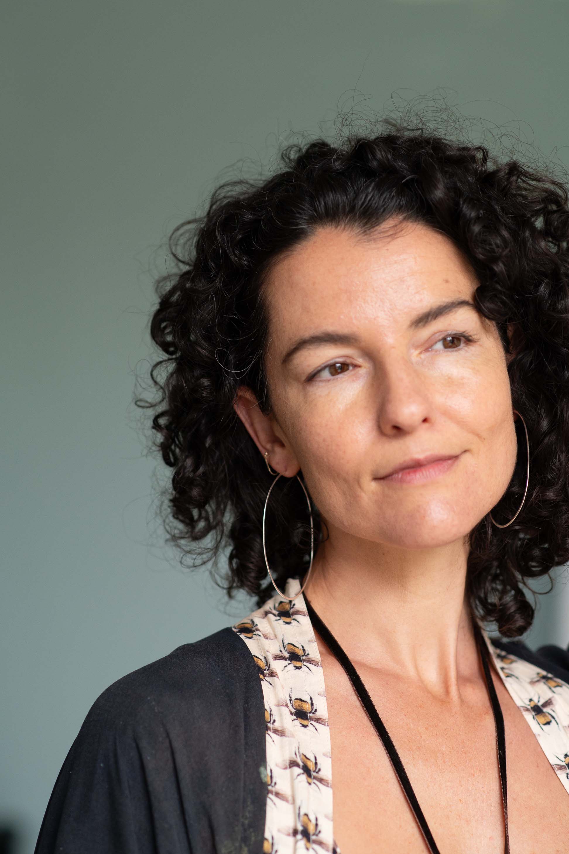 Woman with silver hoop earrings