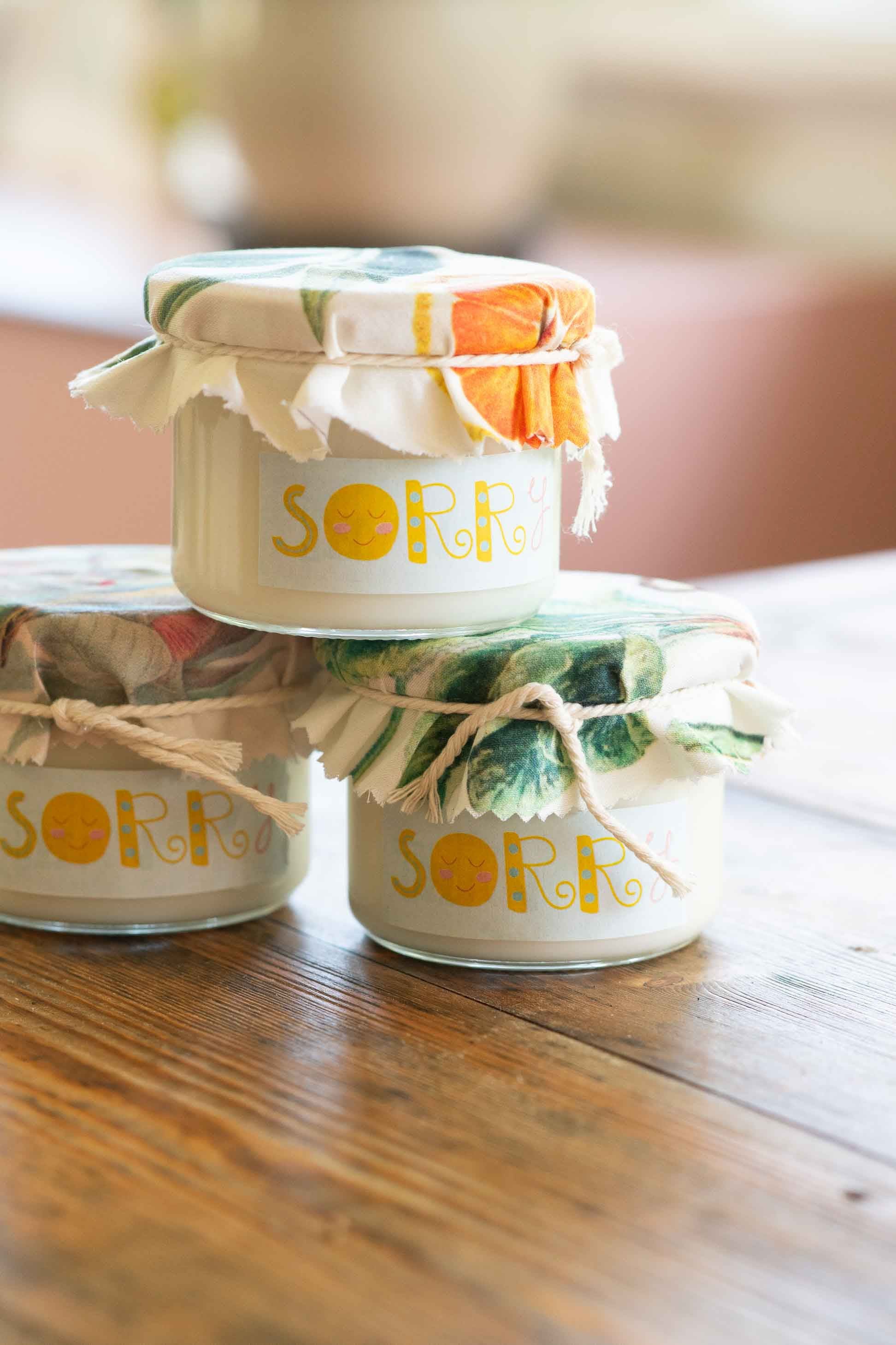 Sorry Candle jars with floral lids
