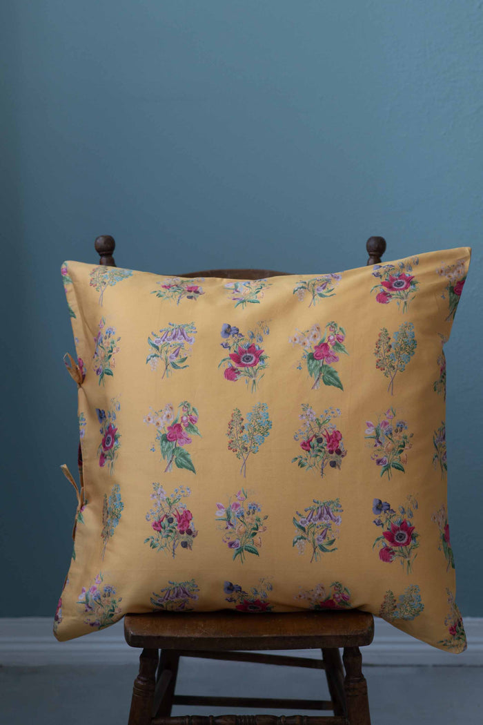 SummerlandEuro floral pillow on chair