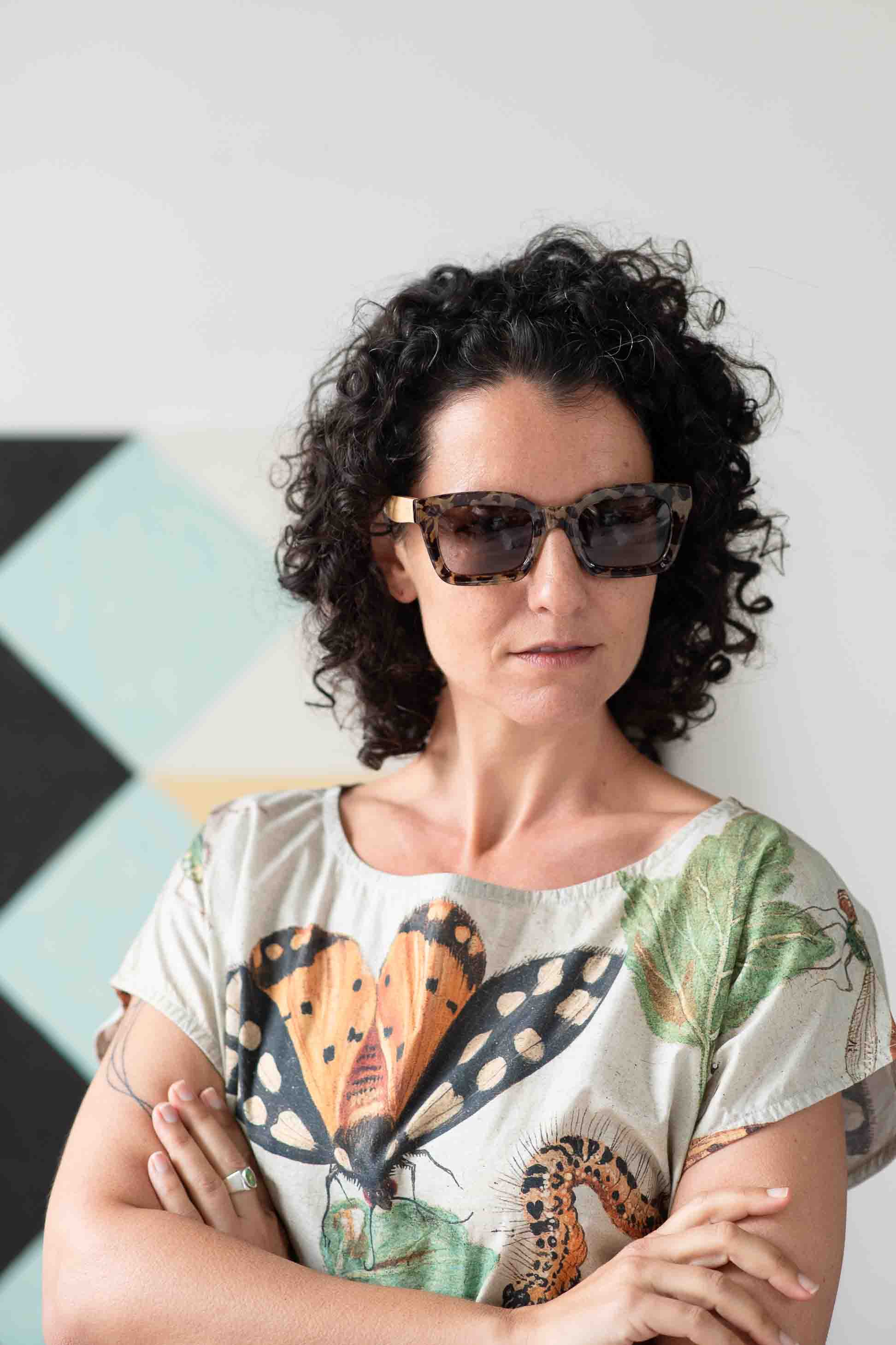 Eleanor in sunglasses, insect print shirt